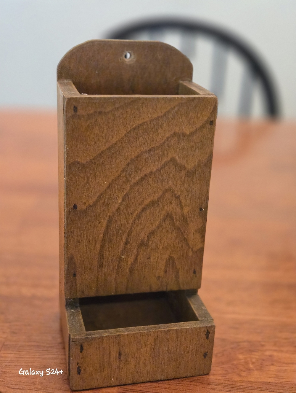 Primativevintage wooden match holder, designed to be hung on a wall .